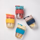 Glass water bottle with straw